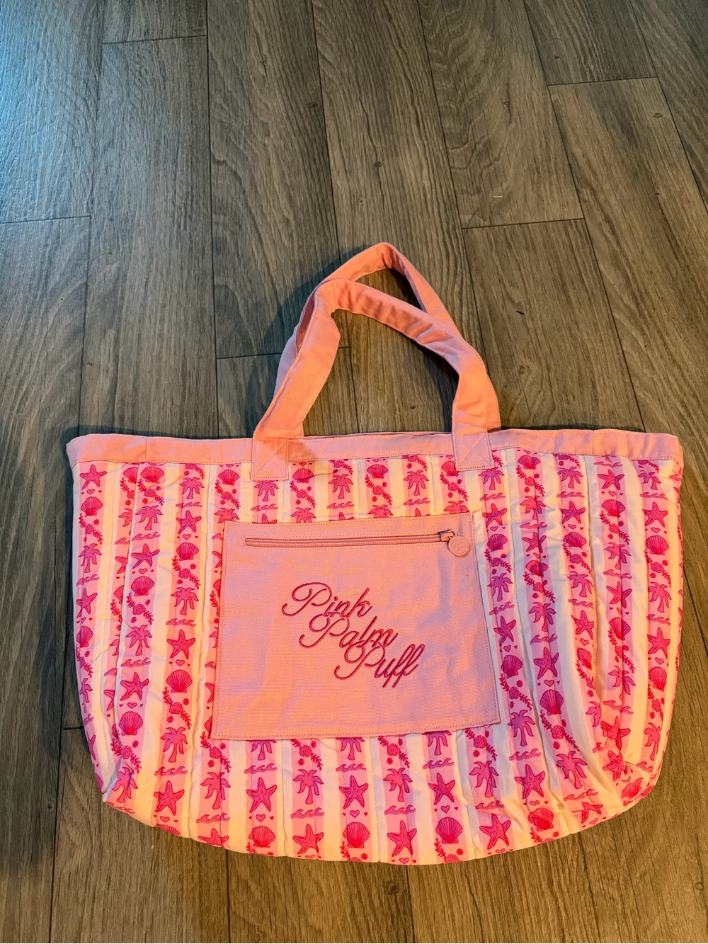 Reversible pink palm puff tote